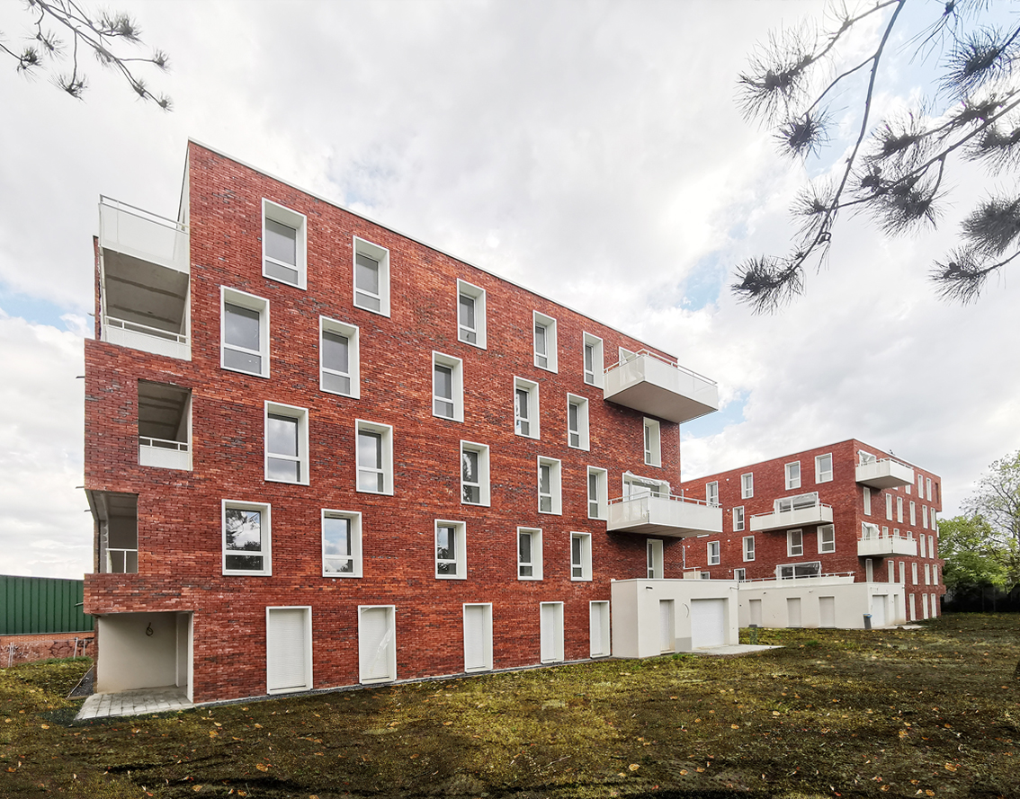Vue générale des 40 logements collectifs à Ronchin autour d'un espace vert paysager partagé