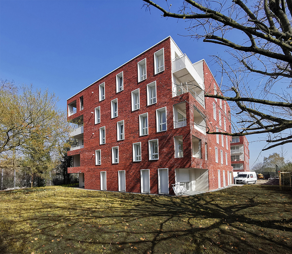 Façade des 40 logements collectifs sociaux à Ronchin avec balcons et volumes en R+4