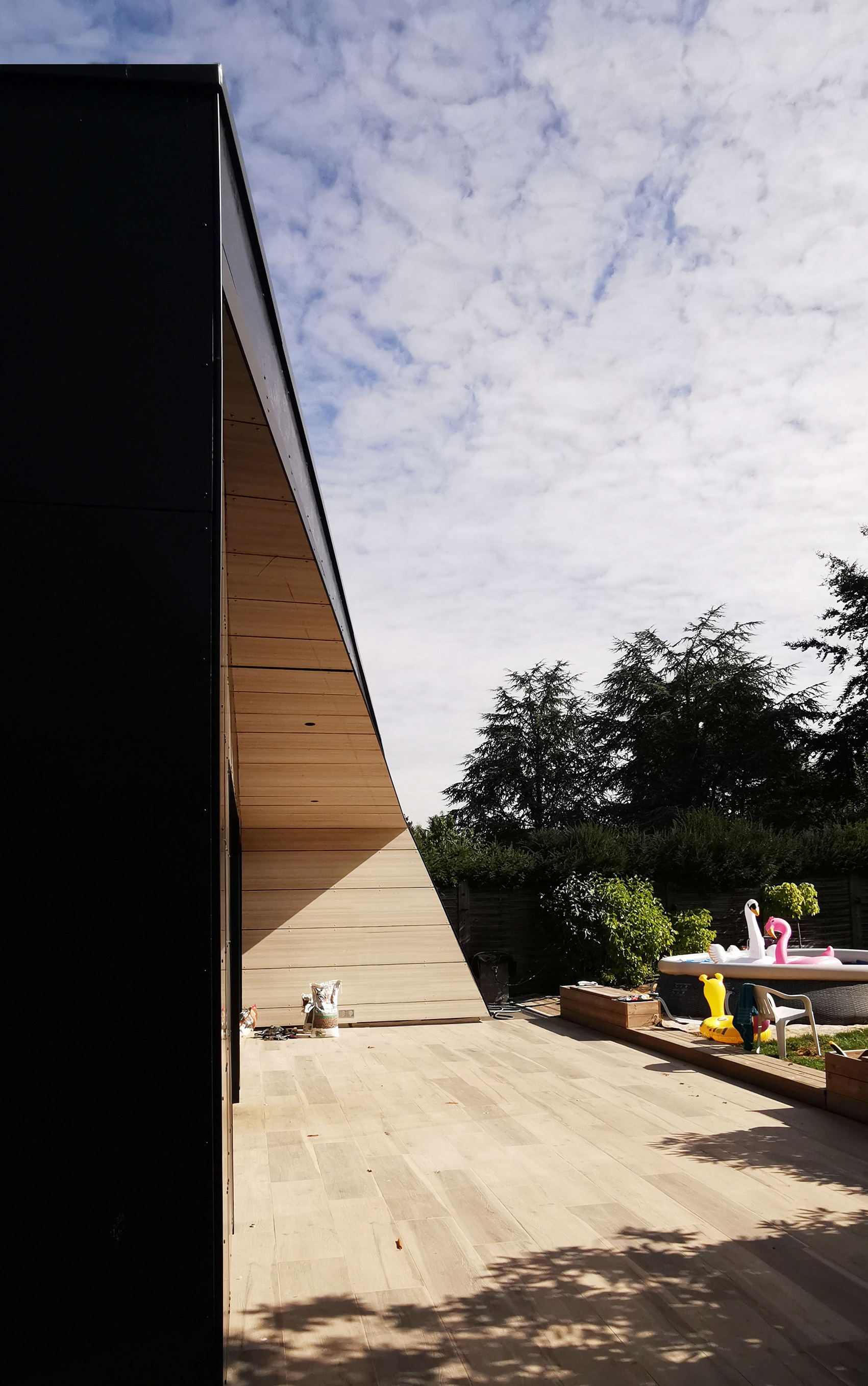 Extension de maison en bois et bardage Trespa à Pont-à-Marcq